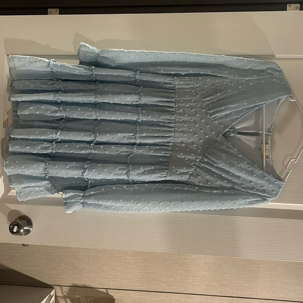 I am selling a blue long sleeve dress from Alter’d State. It is very cute on